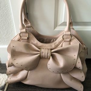 Flush pink bow purse